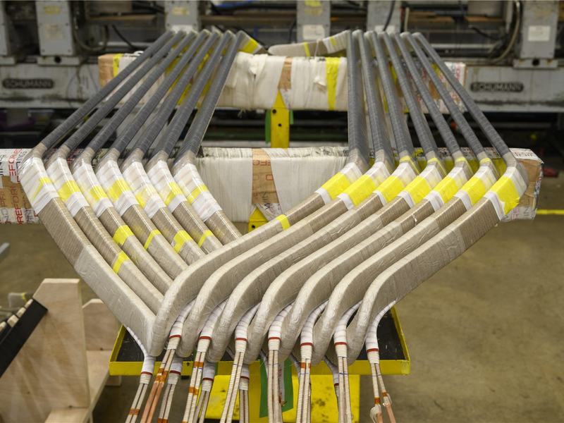 Rows of formed high-voltage bars at Preformed Windings